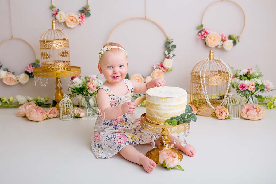 baby girl cake smash, floral flowers theme, gold bird cages and flower hoops