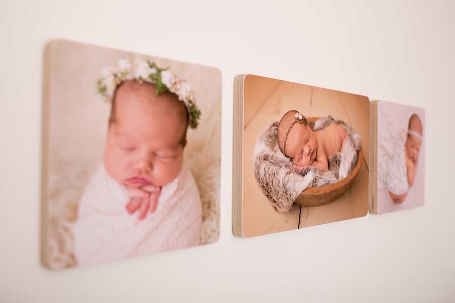a set of handmade birchwood photo blocks with images of babys