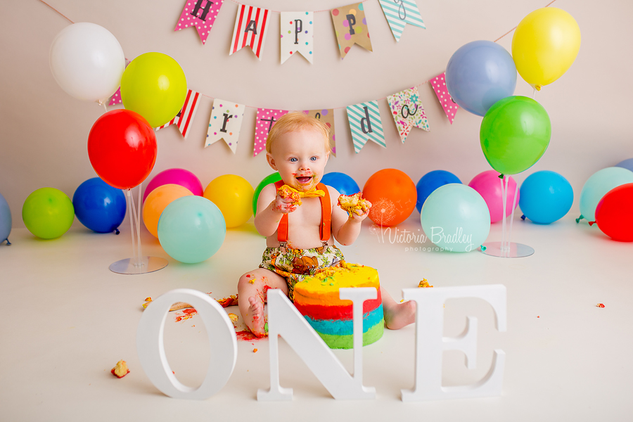 baby boy bright birthday cake smash with rainbow cake