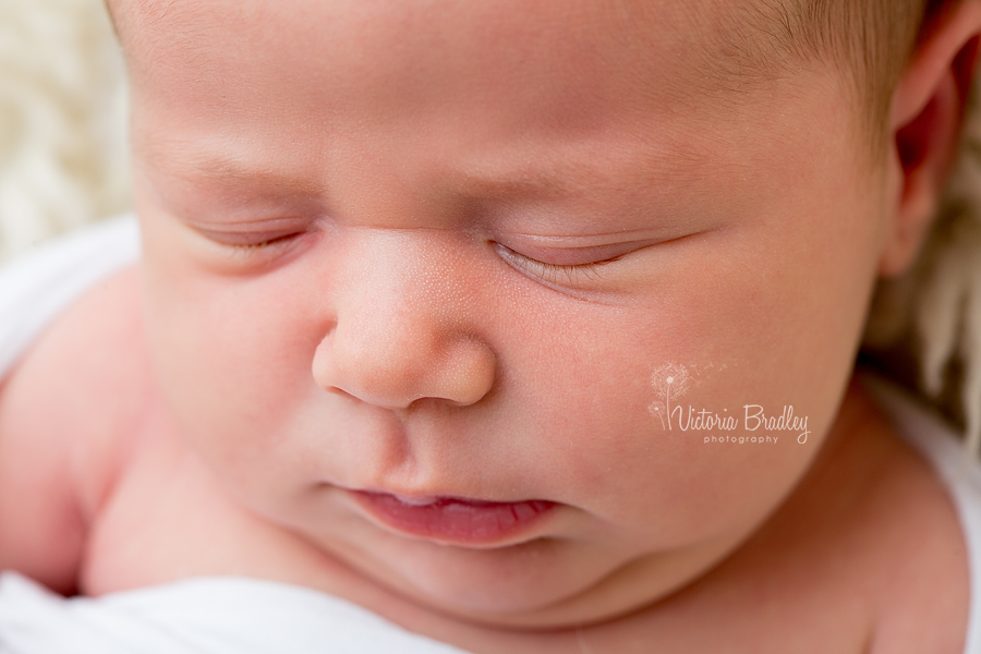 close up macro shot of newborn face