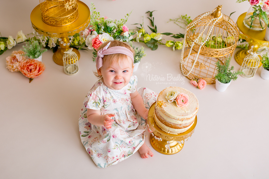 floral baby girl cake smash, bird cages, flowers, baby girl