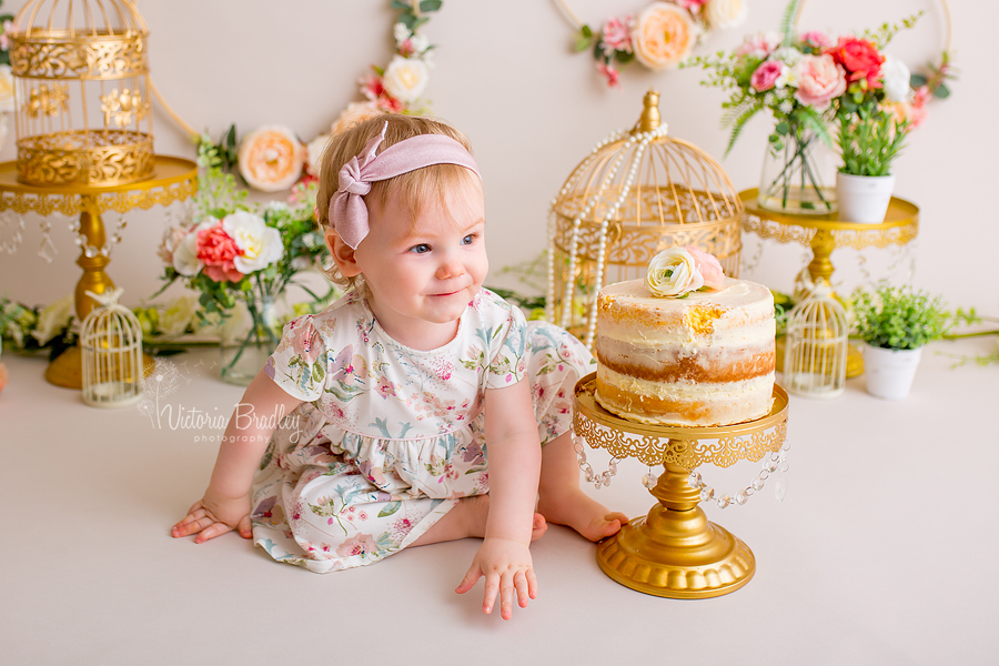 baby girl cake smash with flowers