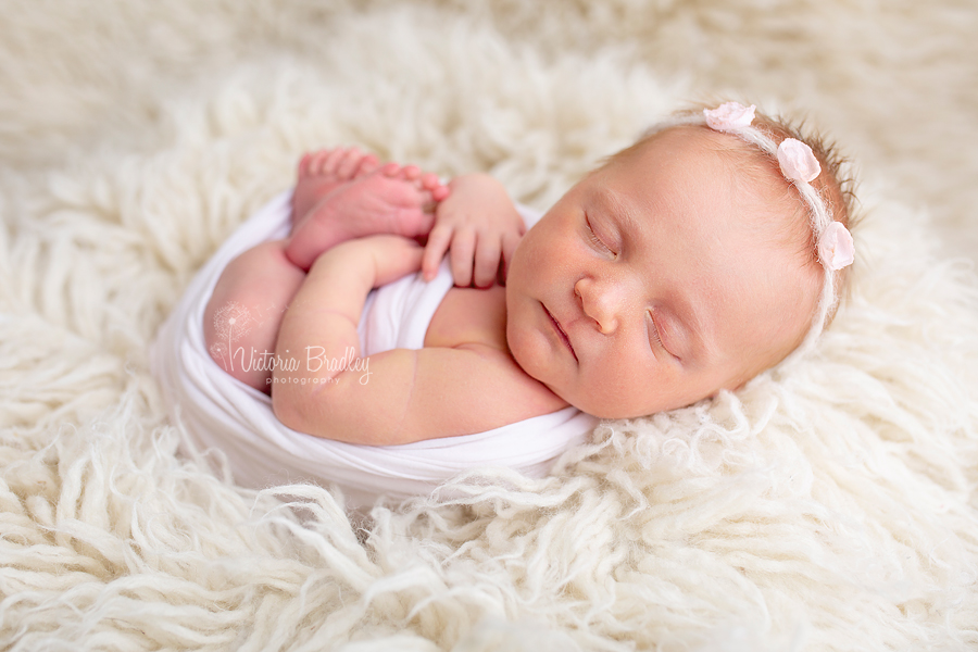 wrapped baby newborn photography