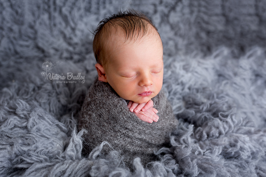 wrapped newborn baby boy photographer, grey
