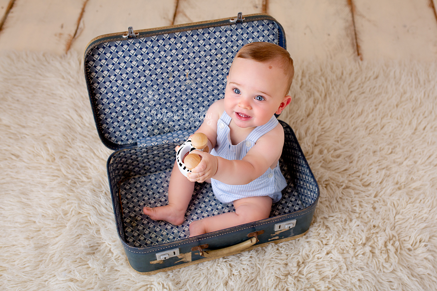 sitter baby boy photography in suitcase