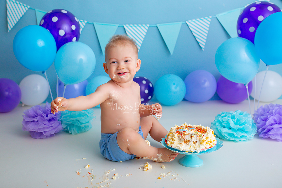 blue and purple baby boy cake smash photography