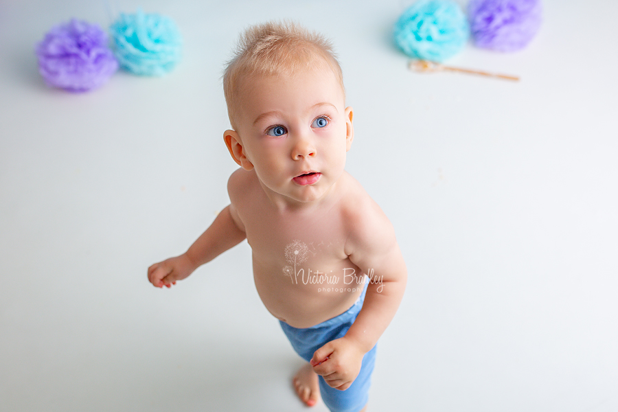 baby boy blue eyes cake smash