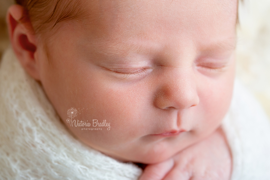 macro of newborn baby girl lashes