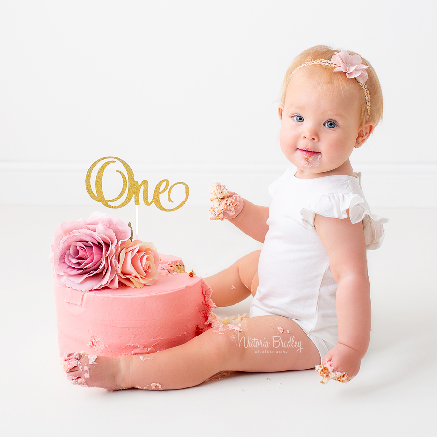 baby girl first birthday cake smash