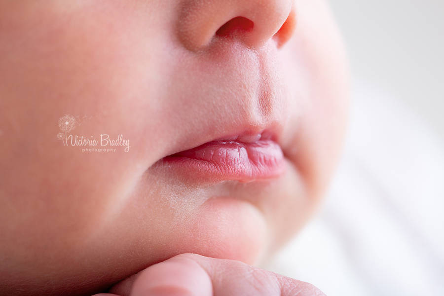 newborn baby photography macro of pout