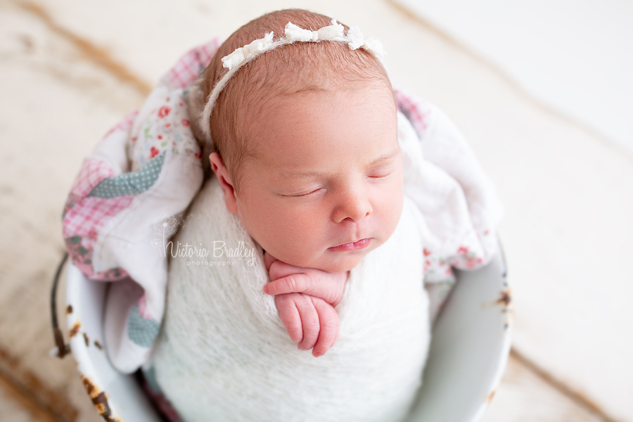 newborn baby photography in white bucket