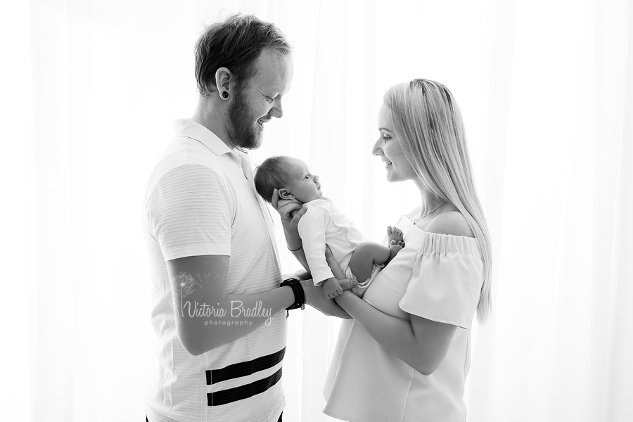 family and newborn photograph in black and white