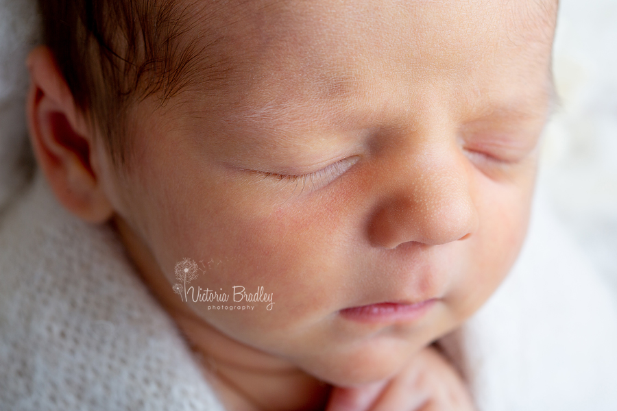 close up of baby newborn face