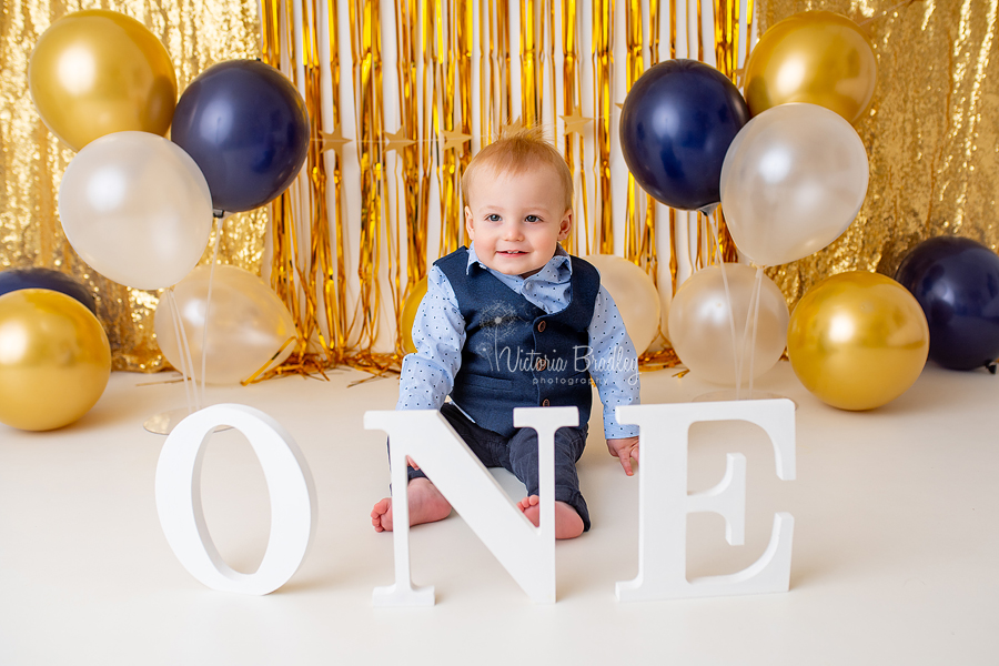 gold and navy cake smash session photography