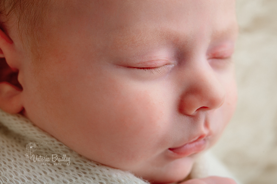 macro of baby face newborn session