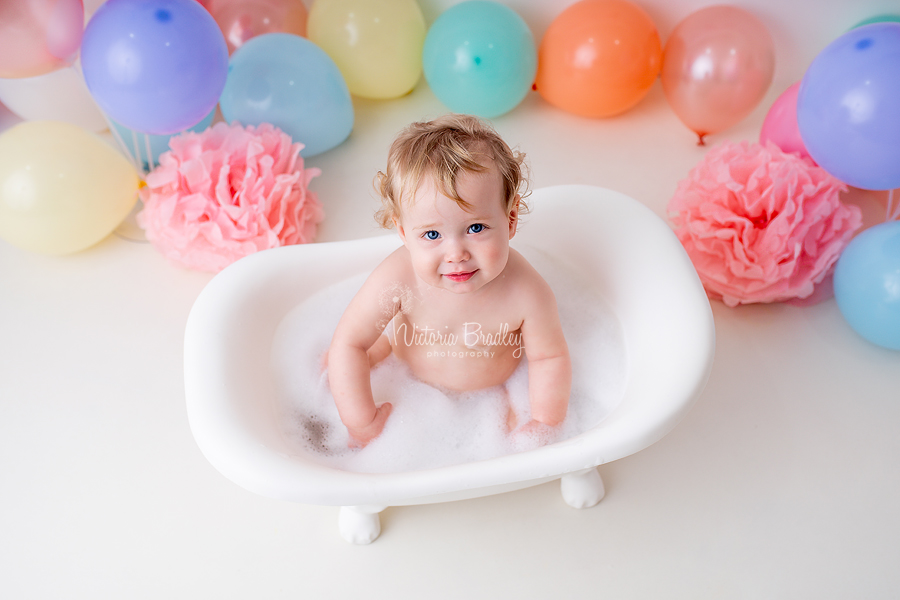 pastel rainbow cake smash photography