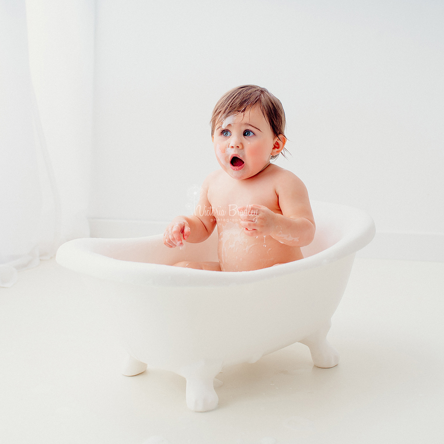 baby in bath white bath tub cake smash