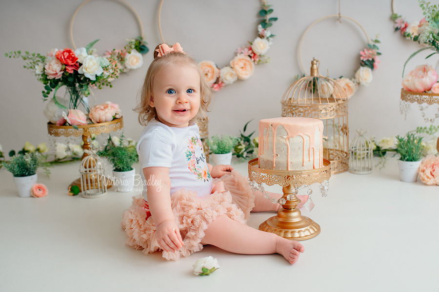 peach floral cake smash photography