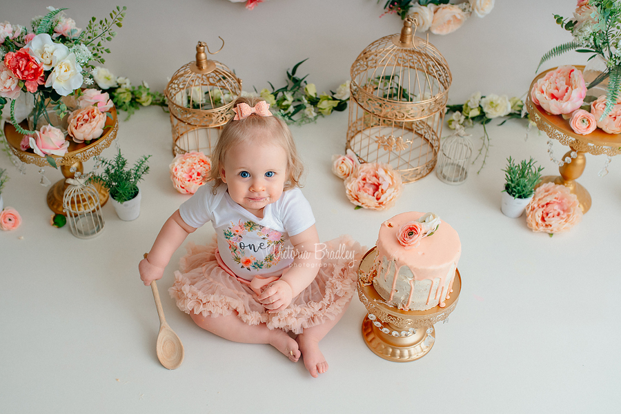 baby girl cake smash peach flowers