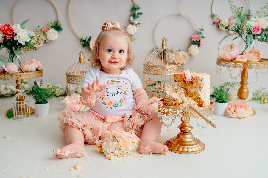 baby girl cake smash flowers