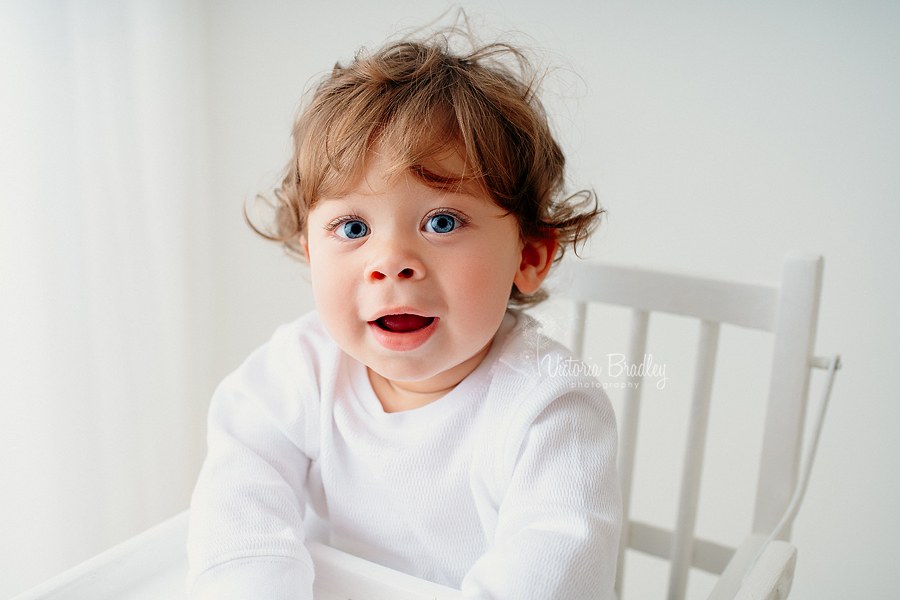 PURE white cake smash baby sat in white high chair