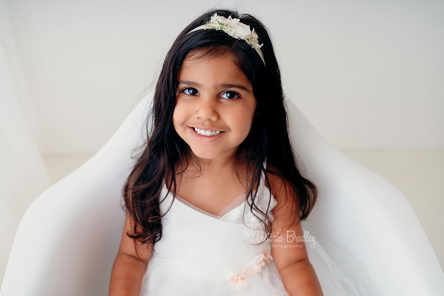 white studio photography 3 year old girl