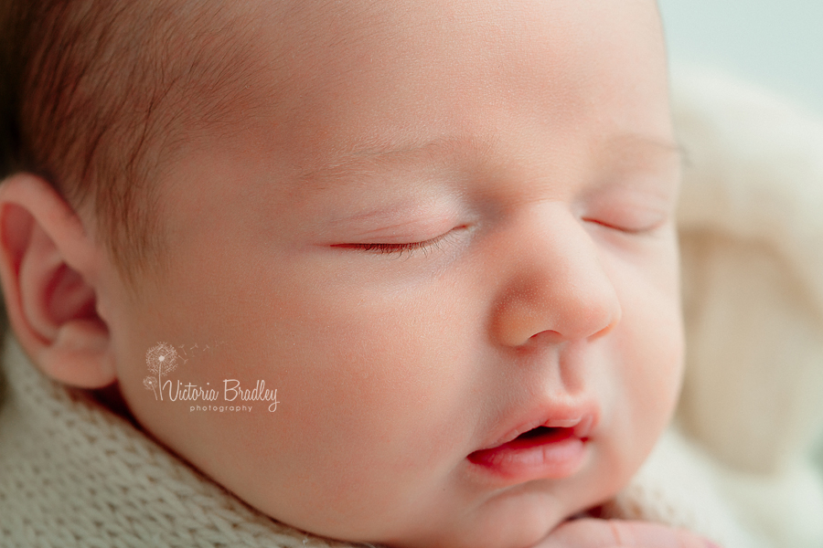 macro of newborn face