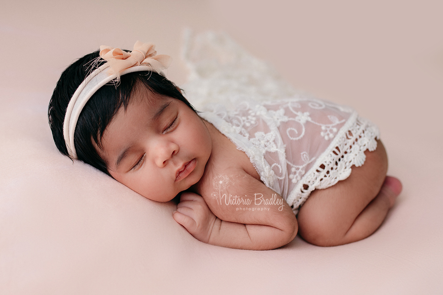 Asleep baby on tummy photography 