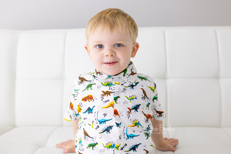 3 year old boy photography on white sofa