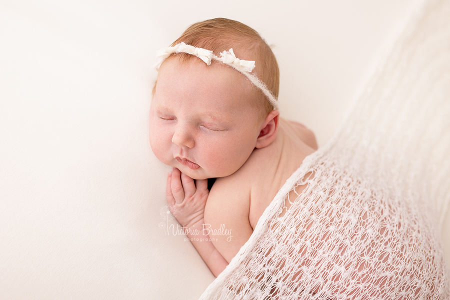 newborn on tummy photography