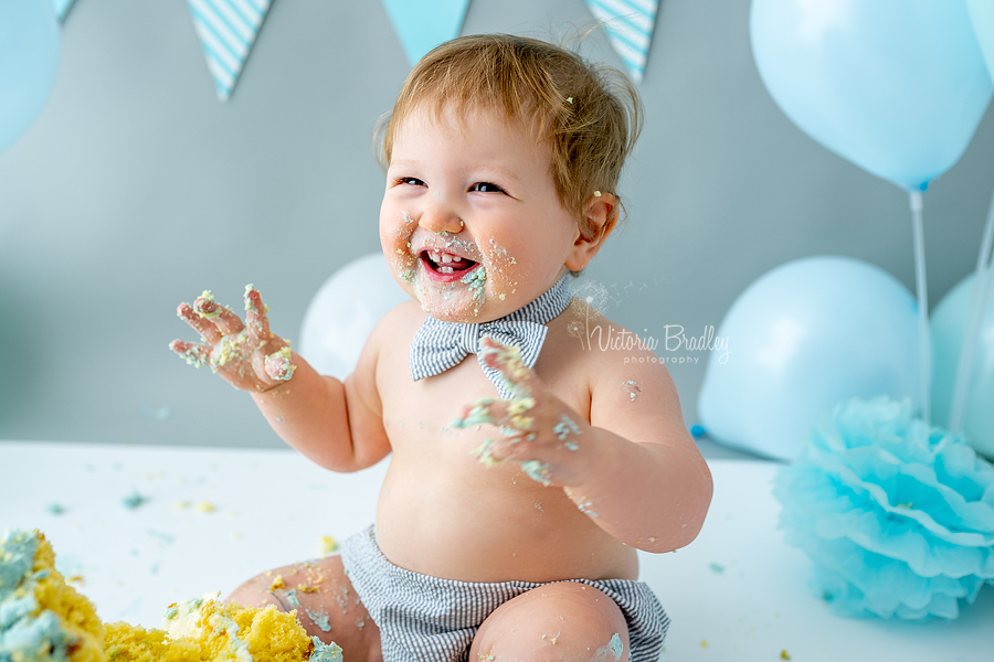 laughing baby cake smash blues and grey