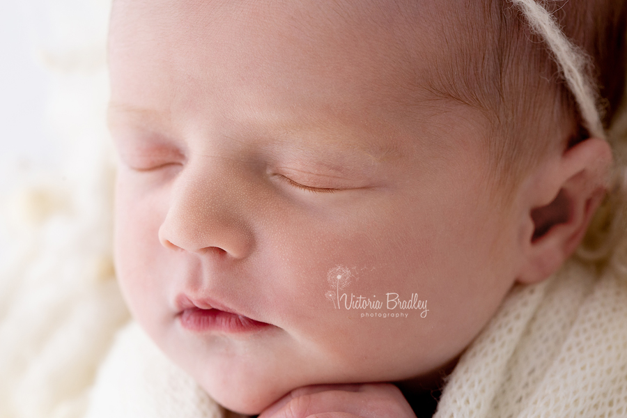 macro of newborn face