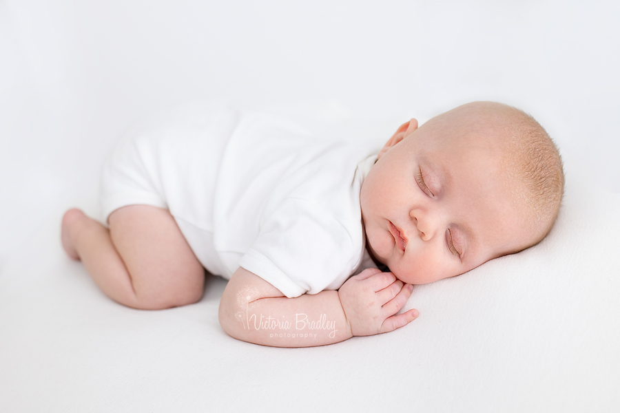 baby boy asleep on tummy photography