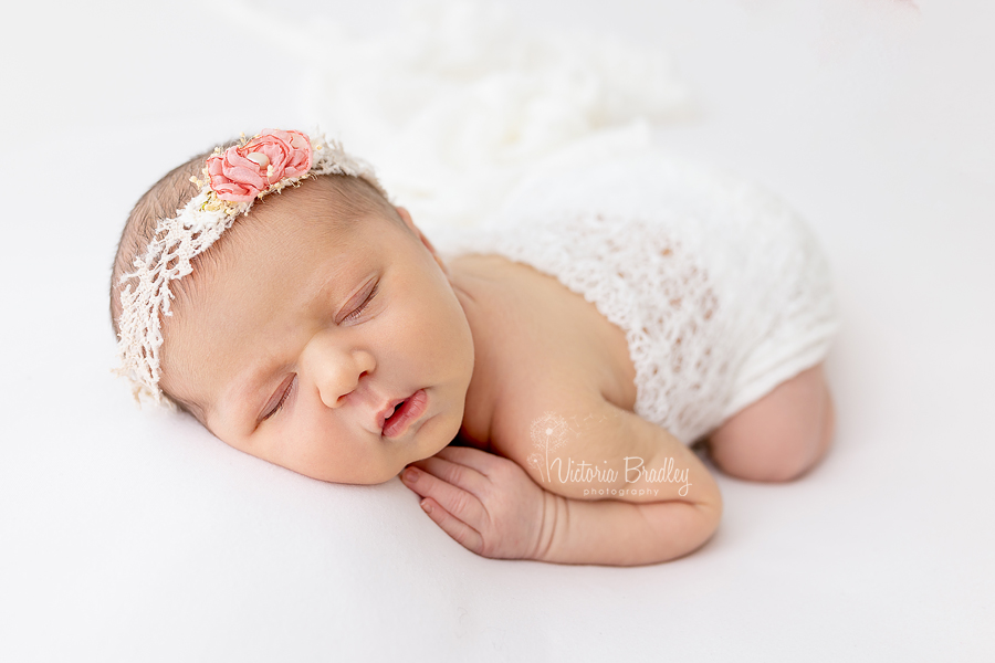 newborn on tummy pose