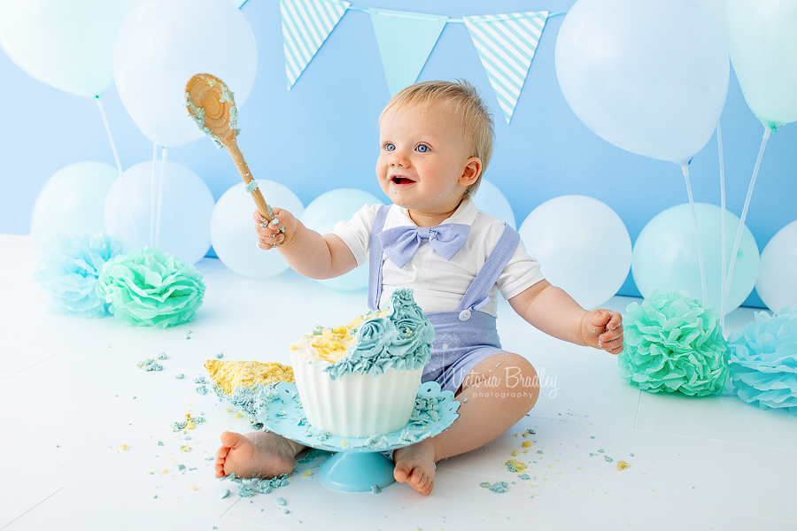 baby boy blue cake smash, practicing for Hogwarts