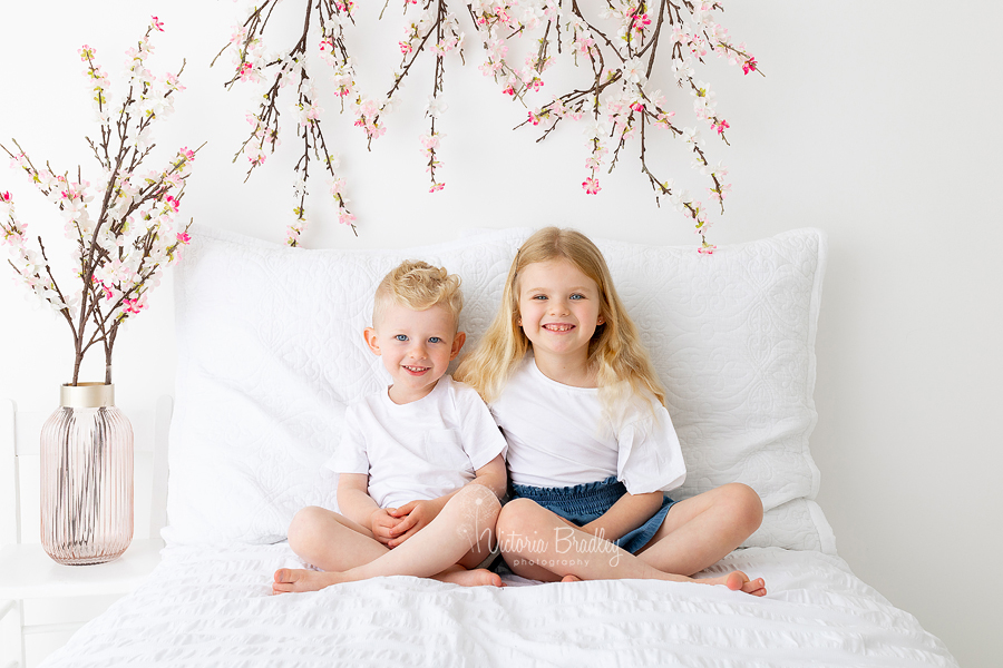 sibling white room photography