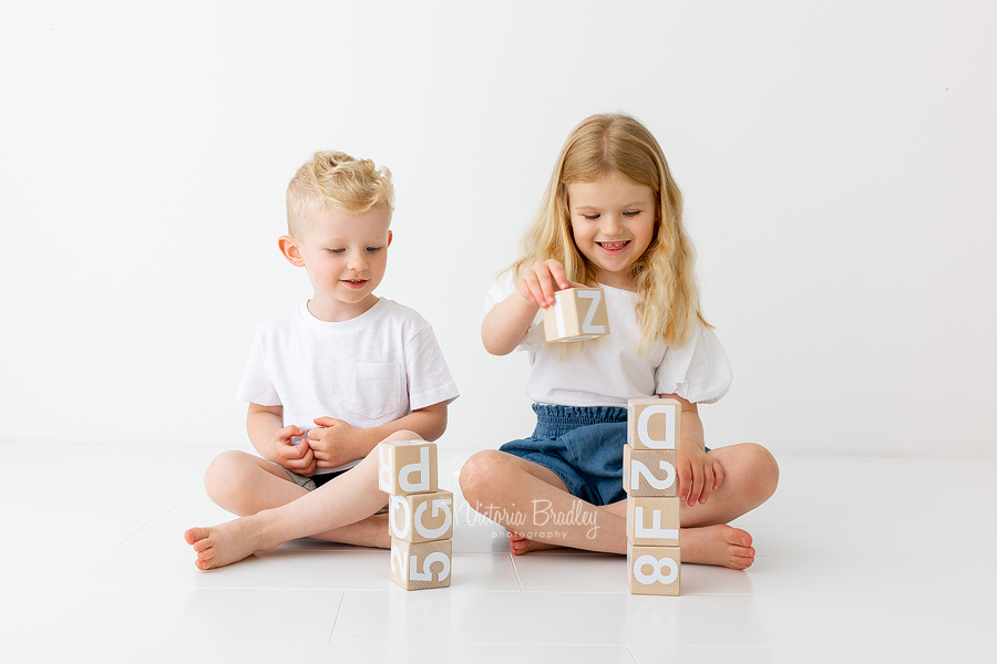 sibling white room photography