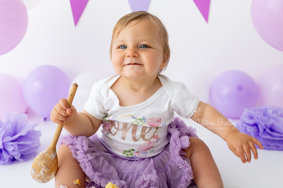 smiling baby cake smash