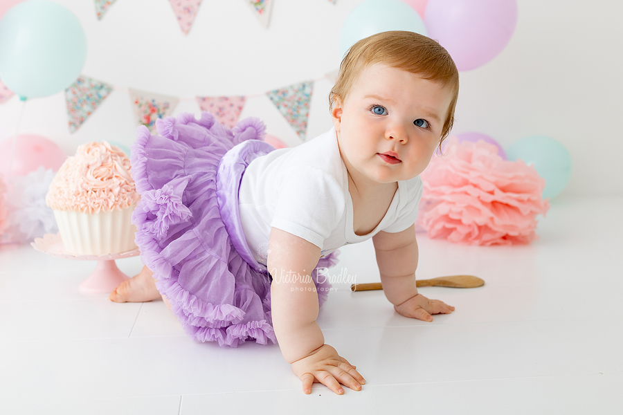 1 year old pastel floral cake smash