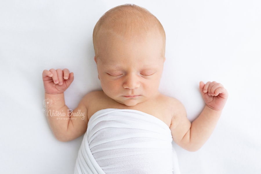 baby newborn boy on white