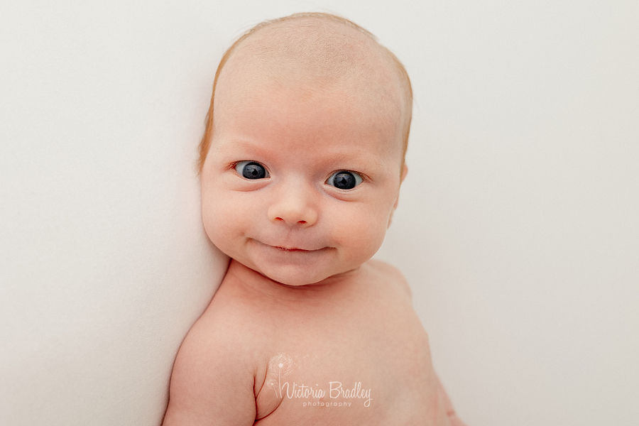 smiling newborn