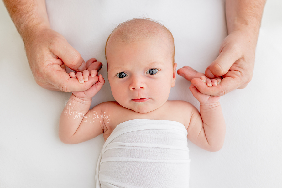 newborn baby on white