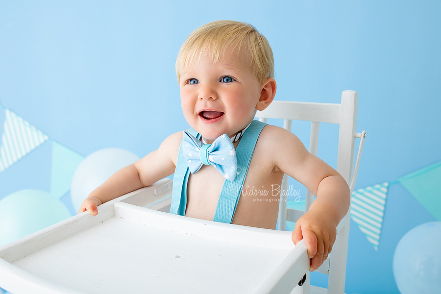 baby boy in high chair