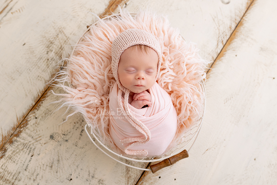 wrapped newborn in pink