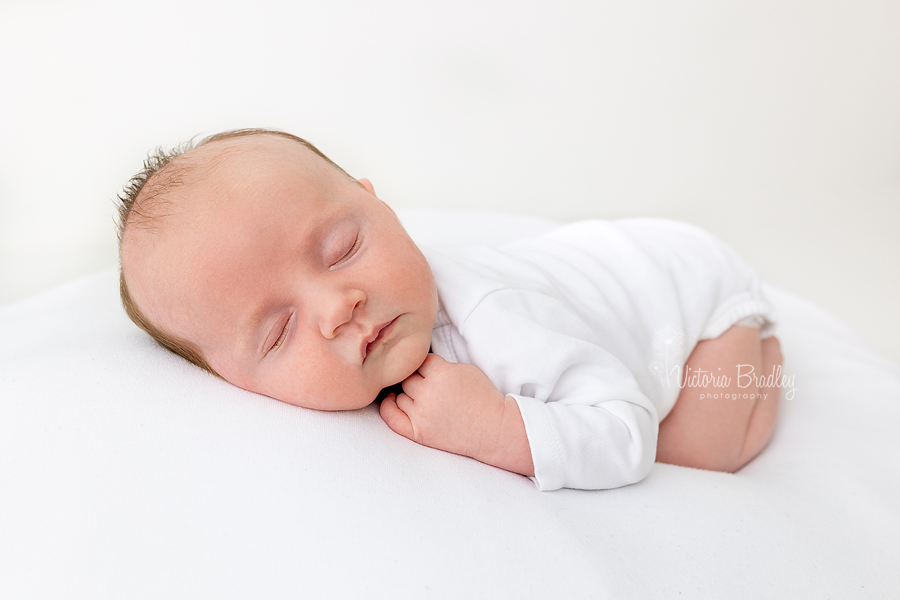 newborn on tummy