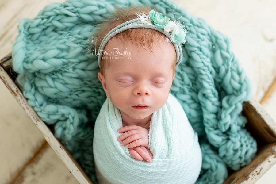 wrapped newborn in mint