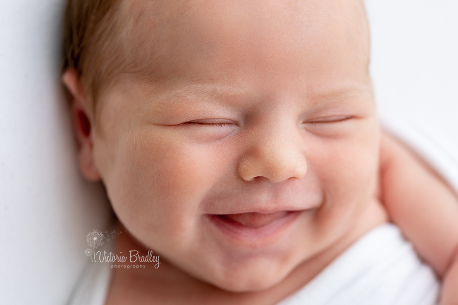 smiley newborn close up