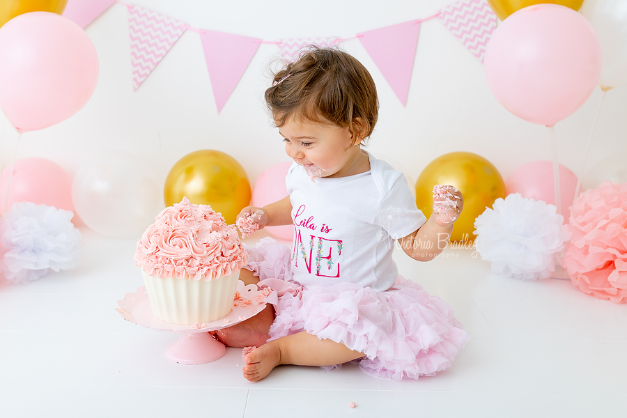 happy baby girl cake smash