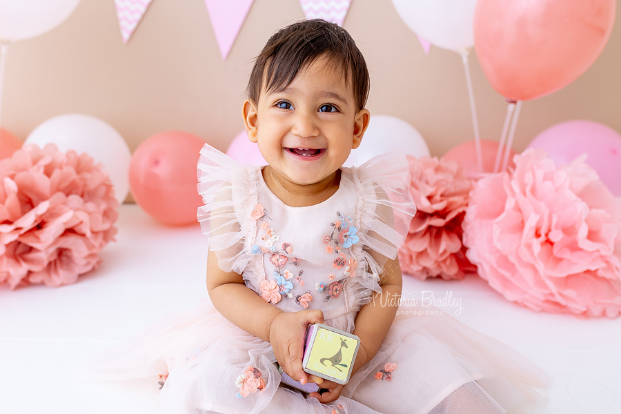 baby girl with toy blocks