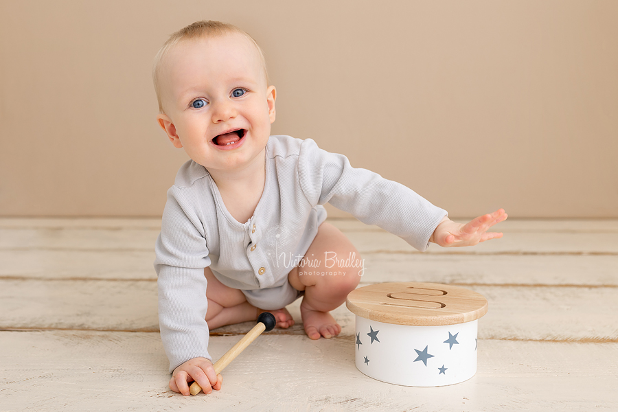 happy baby with drum